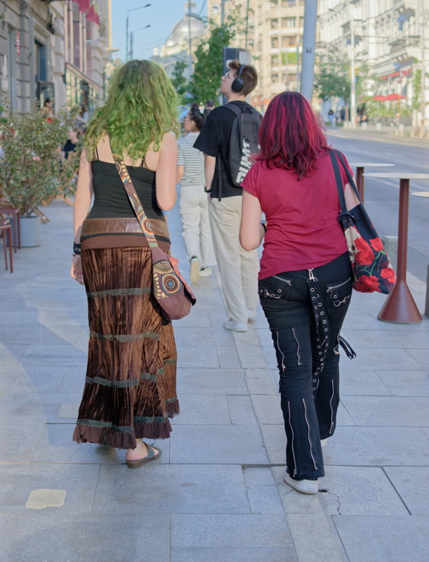 11 - A person in a brown tiered maxi skirt from a thrift shop, capturing a fairycore or bohemian aesthetic